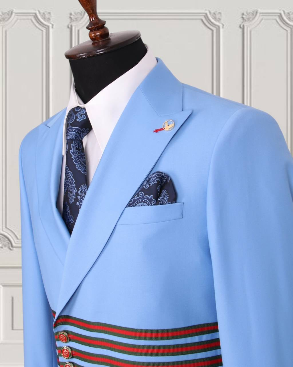 Light blue GEEMAN suit lapel and striped waist detail