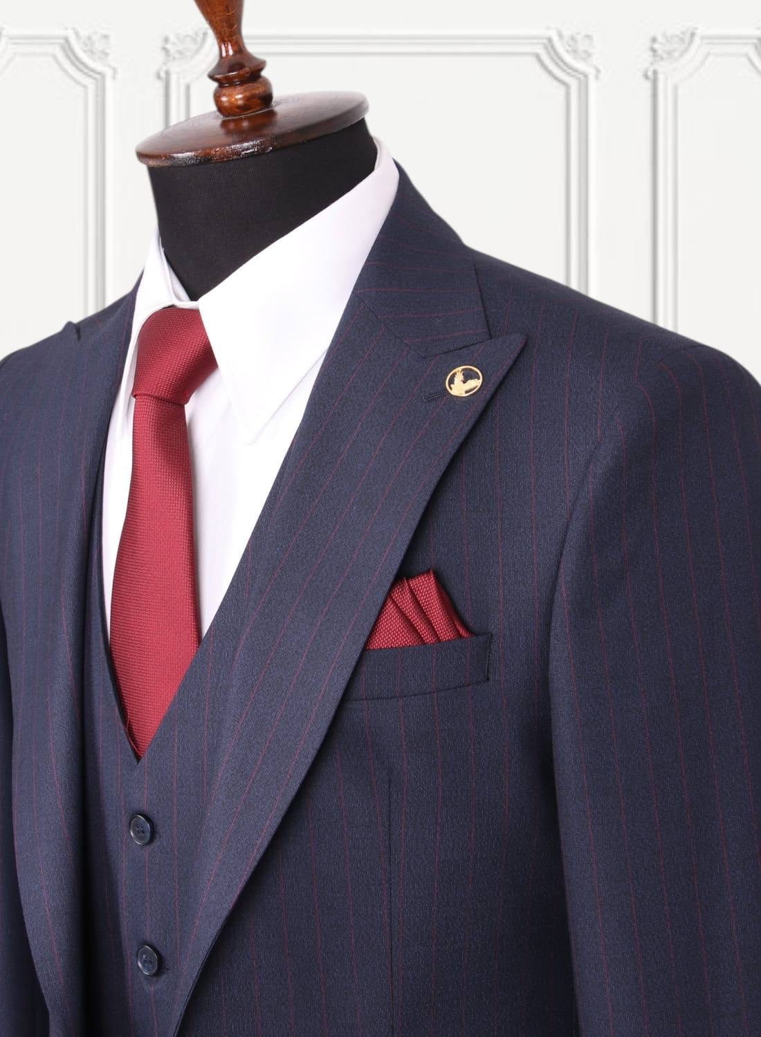 Navy and burgundy pinstripe GEEMAN suit lapel detail