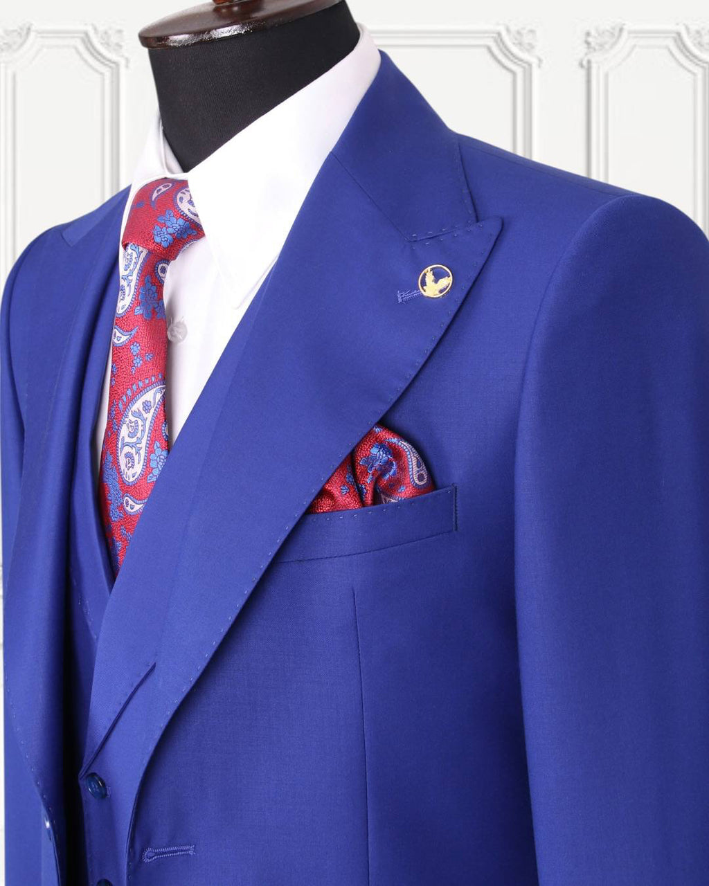 Close-up of royal blue GEEMAN suit lapel and pocket square